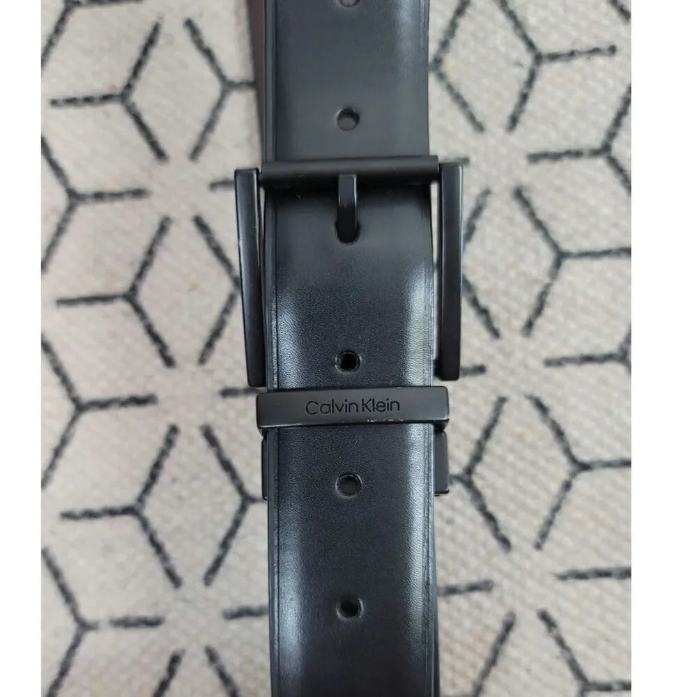CALVIN KLEIN BLACK W BLACK BELT BUCKLE SYTHENTIC LEATHER BELT, SZ MEDIUM